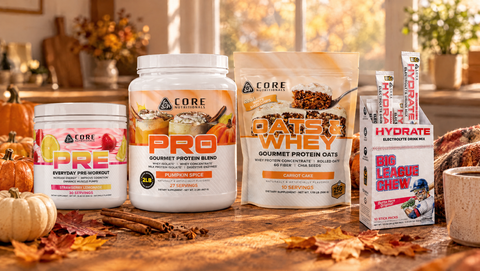 Core Nutritionals PRE Strawberry Lemonade, PRO Pumpkin Spice, Oats and Whey Carrot Cake and Hydrate x Big League Chew on a fall table