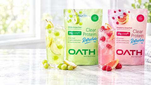 Oath Clear Protein Refreshers White Grape Pear and Raspberry Grapefruit with iced drinks